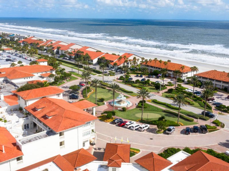 aerial shot of the inn and the beach
