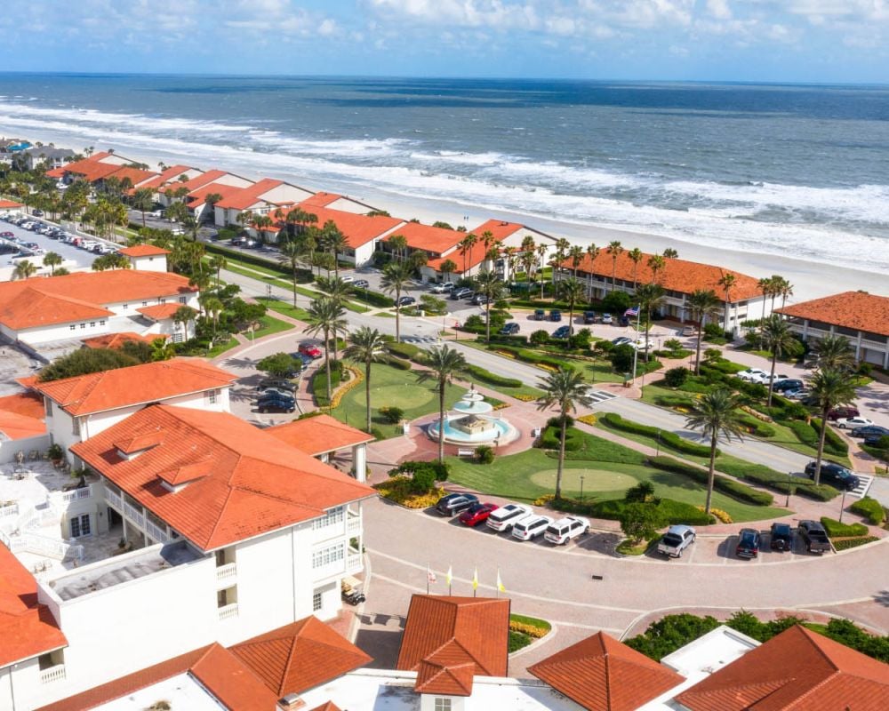 aerial shot of the inn and the beach