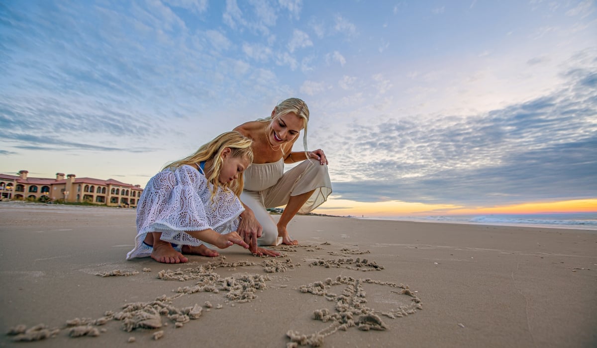 Mother and Daughter playing on the beach at our resort near Saint Augustine, Florida